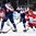 BUFFALO, NEW YORK - DECEMBER 31: Slovakia's Martin Bodak #5 stickhandles past Denmark's Daniel Nielsen #21 during the preliminary round of the 2018 IIHF World Junior Championship. (Photo by Andrea Cardin/HHOF-IIHF Images)

